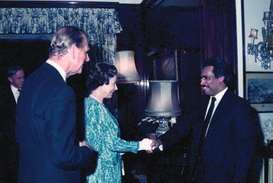 H.E. Saeed Al Nowais greeting guests at an official reception